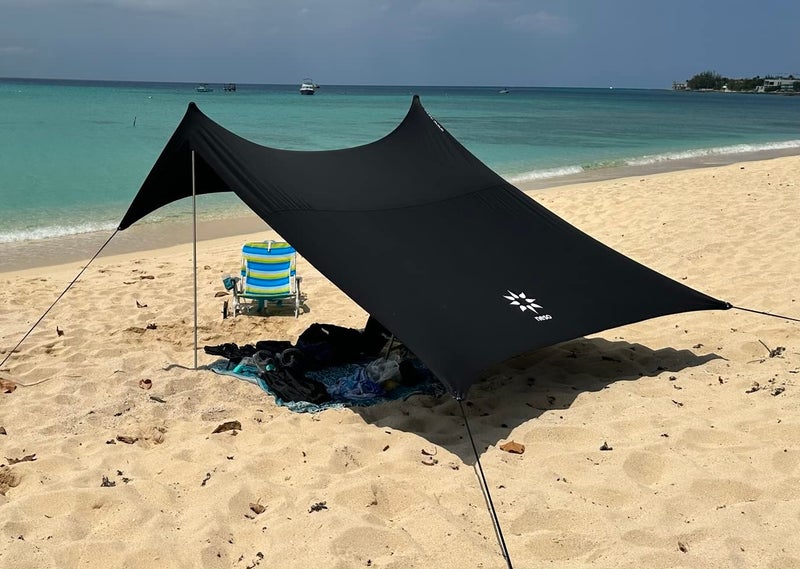 Neso Portable Beach Tent Sun Shelter with Sand Anchor - Lightweight Beach Shade Canopy - Easy Setup for Family Outings - Patented Reinforced Corners - UPF 50+ Sun Protection - 7 x 7ft - Black - Image 1